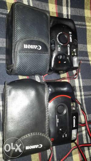 2 Black Canon reel Cameras With Bags it's very neat