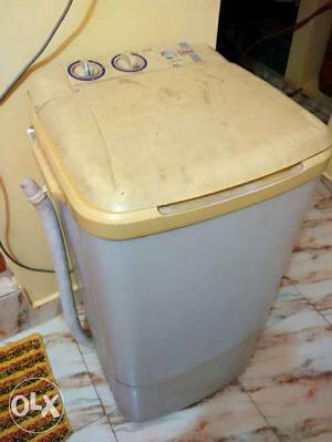 Beige And White Top Mount Washing Machine