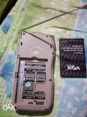 Beige Phone With Vox Phone Battery