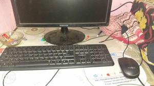 Black Samsung Flat Screen Computer Monitor With Keyboard And