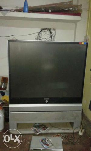 Sumsang 65 inches TV with portable wheel
