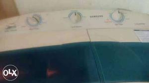 White And Blue Samsung All In One Clothes Washing System