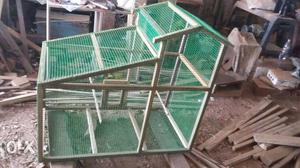 Green And Brown Wooden Pet Cage