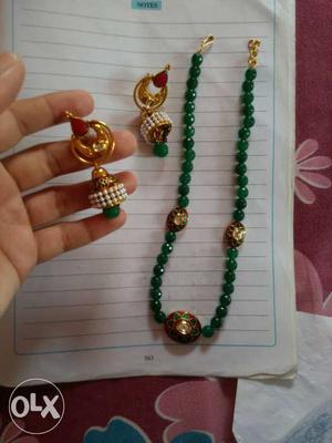 Gold White And Green Jhumkas And Necklace