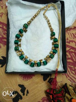 Green beads And gold color bail Necklace