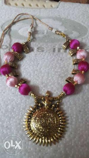 Pink And Gold Round Pendant Necklace