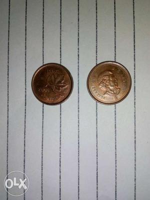 10 years old 2 coins of canadian cent for sale.