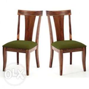 2 Brown Wooden Framed Green Padded Chairs