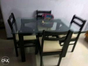 4 seater wooden dining table in a good condition