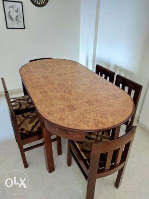 6seater table, 6 cushioned chairs, solid and