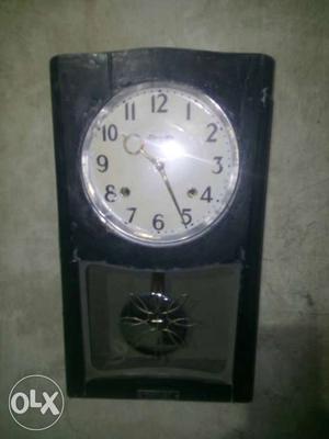 Black Pendulum Clock