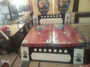 Black and white double bed with storage Call
