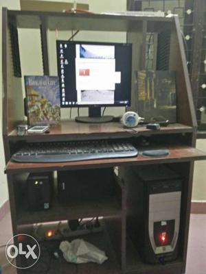 Computer Tower,monitor Keyboard,mouse And Brown Wooden
