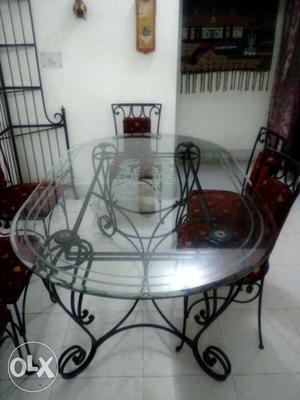 Dining table with six chairs & one corner stand.