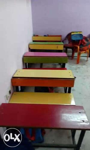 I HV total 10 wooden coloured desks,slide,sea