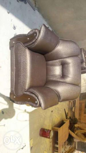Metallic Silver Leather Padded Sofa Chair