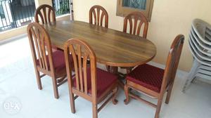 Sag wood dining table with six chairs in very