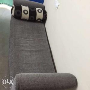 Settee with cushion in good condition