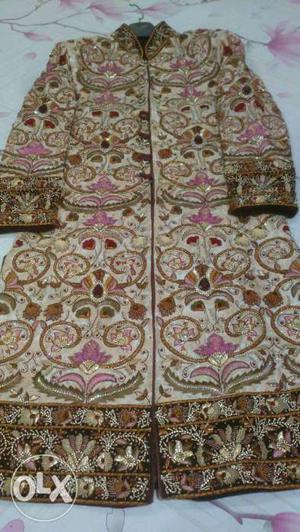 Sherwani in new condition with heavy work worth