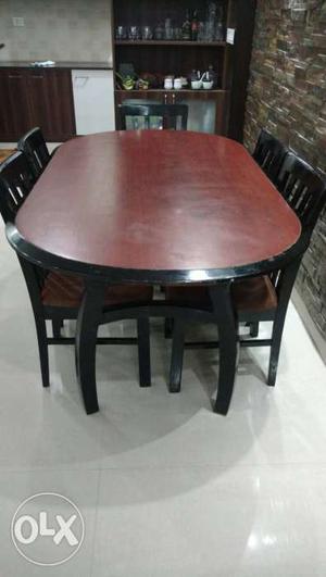 Teak wood dining set with 6 chairs