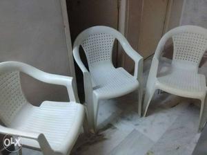 Three plastic chairs, very good condition