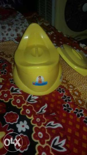 Baby potty port yellow colour with doubled cover
