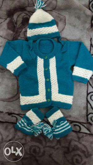 Baby's Blue And White Beanie Booties And Sweater