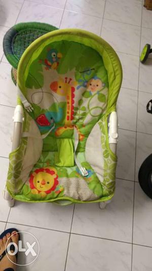 Baby's White And Green Bouncer Seat