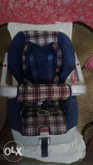 Blue baby car seat.