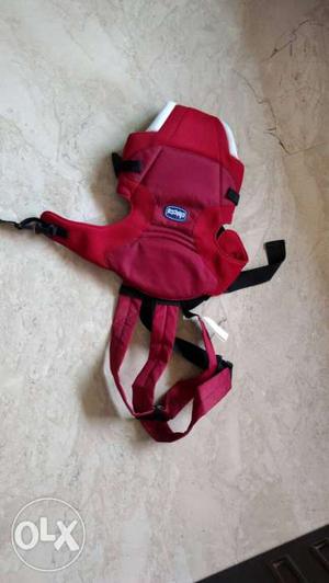 Chickko Baby Carrier red in colour. 3 to 9 kg