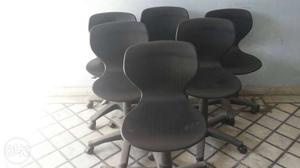 6 black Revolving chairs
