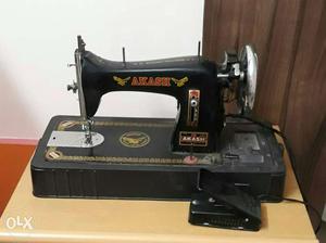 Aakash sewing machine in a working condition.