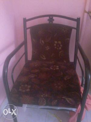 Black Iron Frame And Brown Floral Padded Armchair
