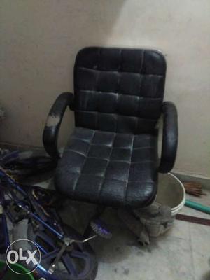 Black Quilted Rolling Armchair