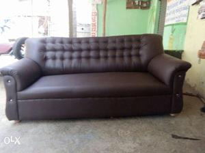 Brown Leather Tufted Sofa