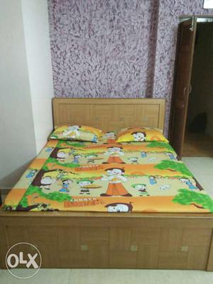 Brown Wooden Bed with matress