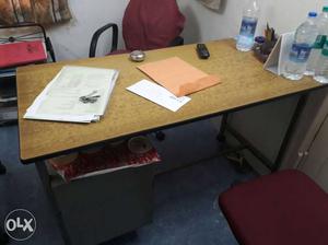 Brown Wooden Desk With Papers