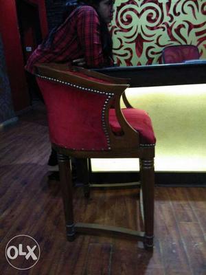 Brown Wooden Framed Red Pad Armchair