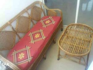 Cane sofa with center taable