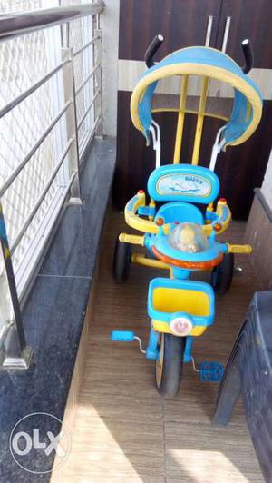Children's Yellow And Blue Ride On Trike