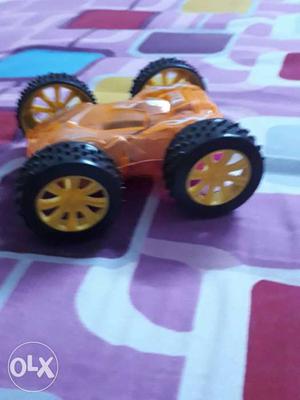 Children's Yellow And Orange Toy Car