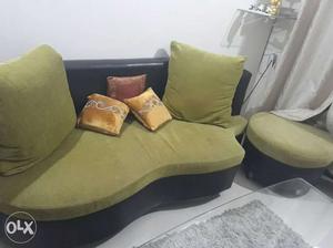 Green Suede Padded Couch With Throw Pillows