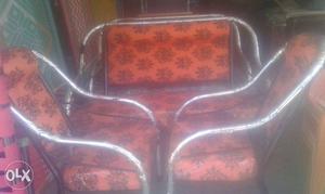 Orange And Black Floral Fabric Padded Chairs And Sofa