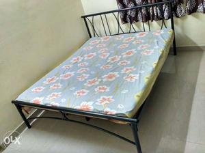 Queen size metal bed with Floral Mattress