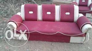 Red And Beige Padded Sofa