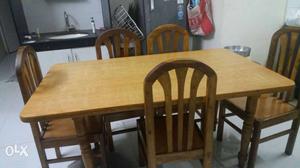 Six seated wooden dining table for sale at Baner