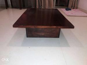 Solid wood centre table,Low height, brown colour.