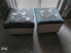 Two White Green And Brown Fabric Padded Ottomans
