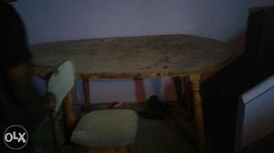 Used dining table with one chair