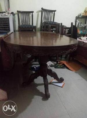 Brown Wooden Oval Top Table